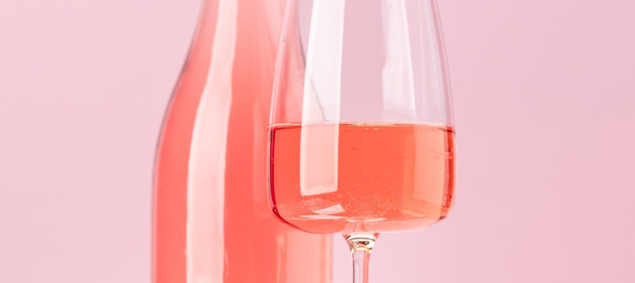 Rose wine bottle and wine glass