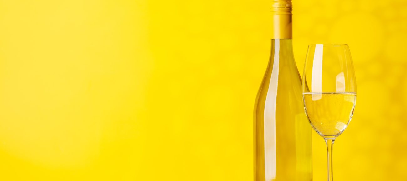 White wine bottle and wine glass