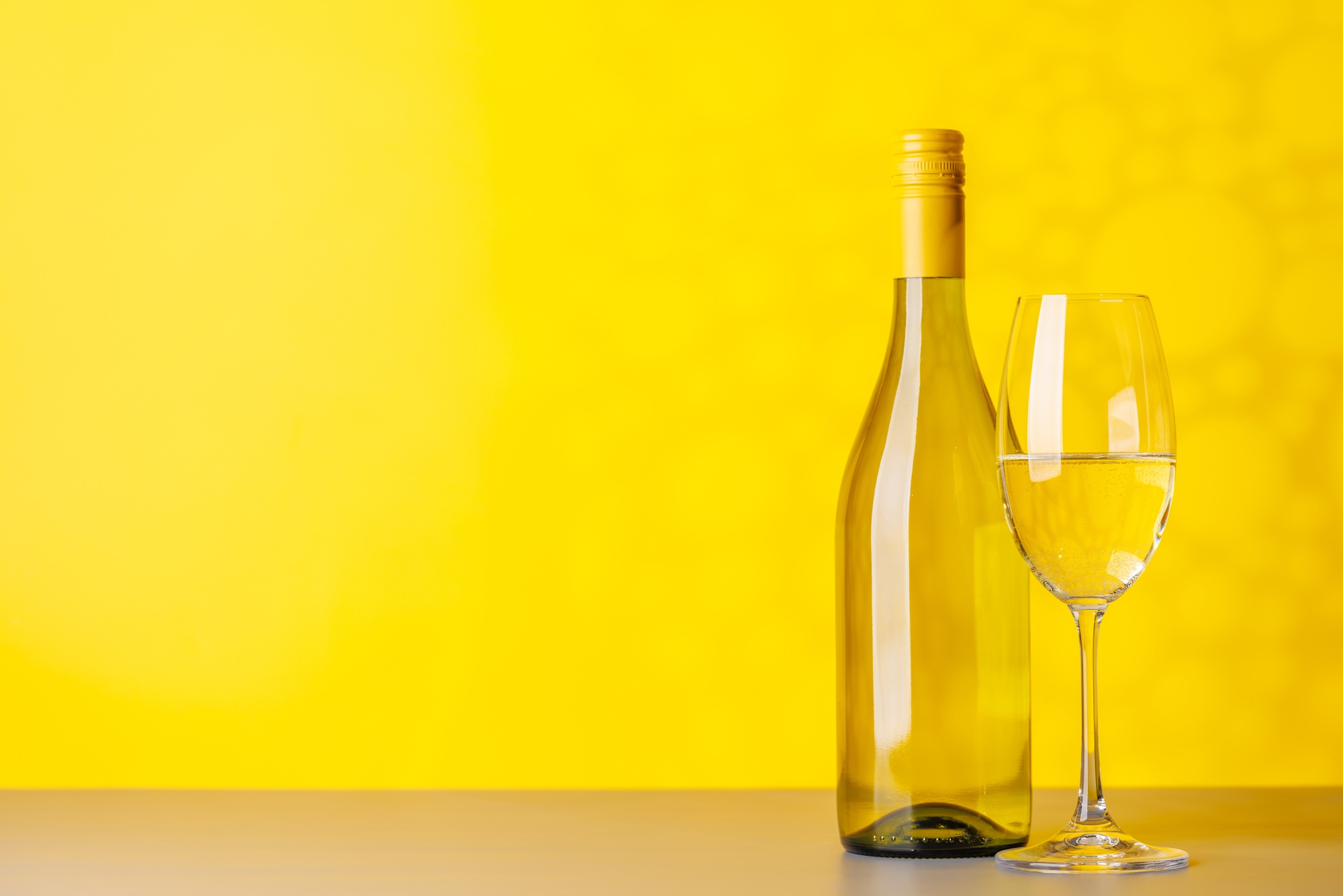White wine bottle and wine glass